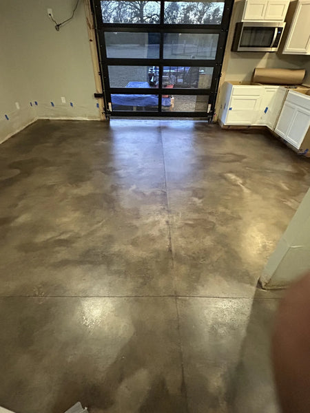 Apartment with EverStain black acid stained concrete floor