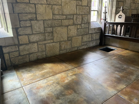 Close-up image of the newly stained chapel floor with Malayan Buff