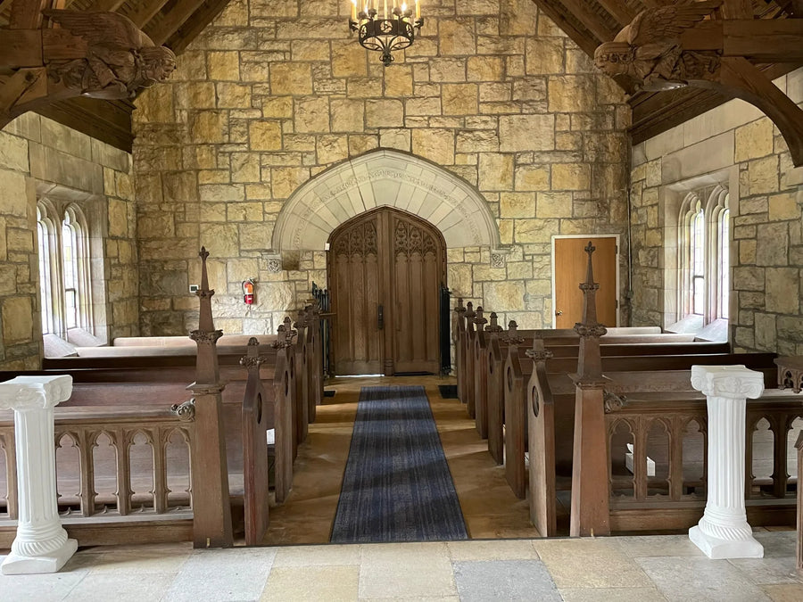 "Post-renovation photo of the chapel floor, looking towards the front door, stained in Malayan Buff