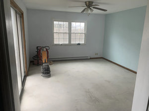 Raw concrete floor after grinding, ready for the application of acid stain