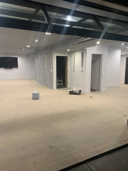 The concrete floor has been cleaned and prepped, ready for the application of stain after thorough surface preparation