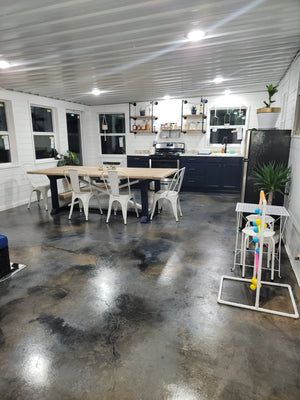 Sealed and polished Stone, Iron Gray and Black stained concrete floor