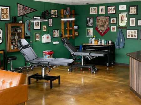 Malayan Buff and Shifting Sand acid stained concrete floor in a tattoo studio