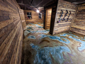 The shop floor with wet acid stain, drying and showing a more defined marbled pattern