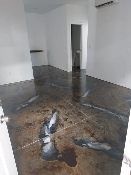 Residential floor stained with ColorWave water-based stain, showing white streaks with stone grey filled in with steel grey, sealed with gloss acquaseal