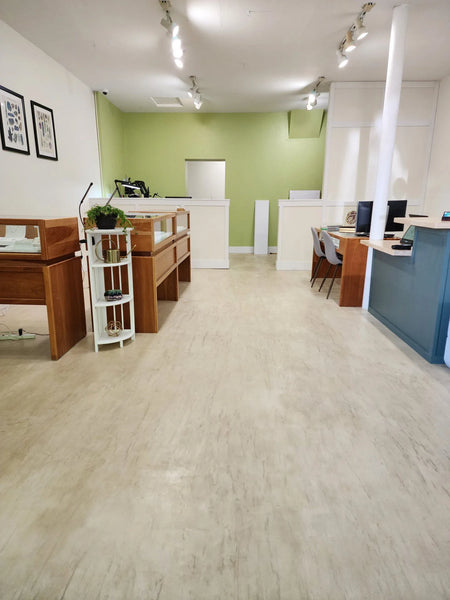 Artistic woodgrain effect achieved by skillfully troweling and burnishing the textured top coat