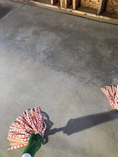 White Stain Applied to Concrete Floor Using Handheld Pump Sprayer and Dry Mopped