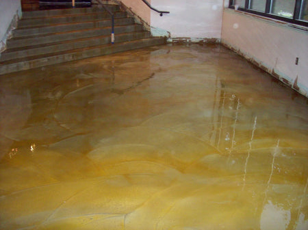 Acid staining swirl finish concrete overlay