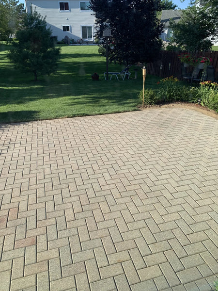 Old faded concrete patio pavers