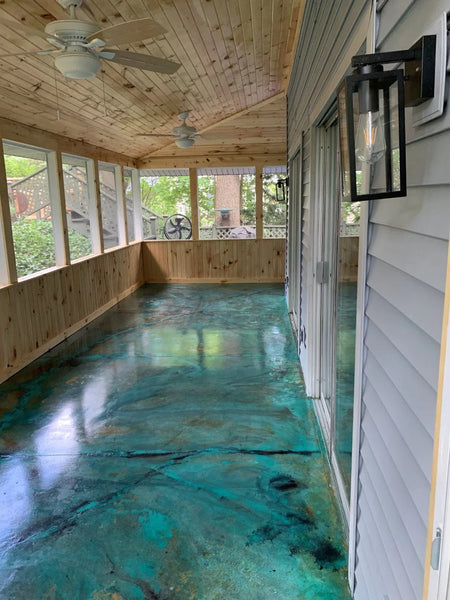 Porch transformation using a combination of azure blue and seagrass mixed with Miracle-Gro