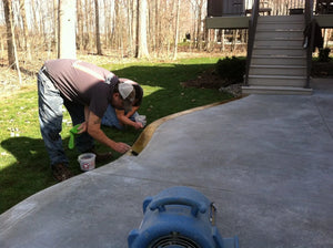 Applying Blackish Acid Stain to Outdoor Concrete