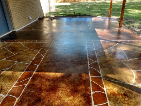 Smooth concrete patio acid stained to look like faux flagstone in Coffee Brown, English Red, and Malayan Buff EverStain, sealed with EasySeal