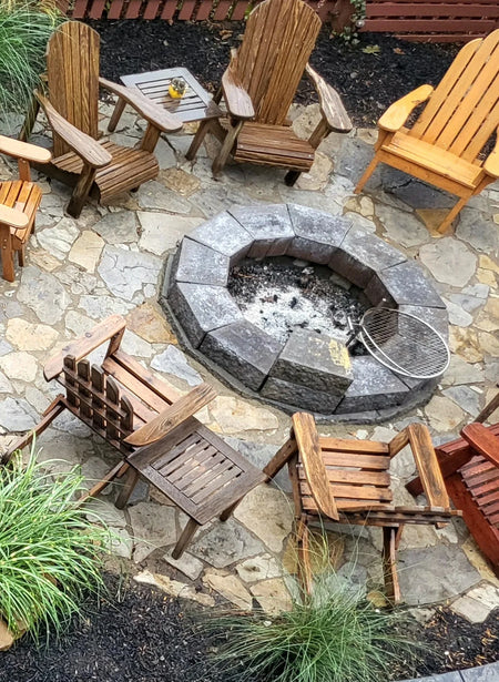 Stained natural stone patio with gray concrete stain