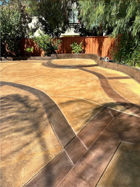 1,500-square-foot scored concrete patio unified with Aztec Brown and Cafe Royale Antiquing Stain