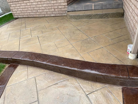 Stamped concrete patio restored with Khaki Antiquing Stain and contrasting Aztec Brown borders and steps