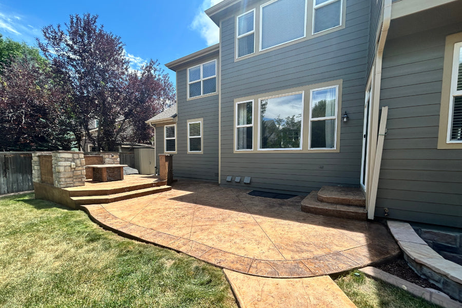 Stamped patio restored with Cafe Royale Antiquing™ Stain, showing rich brown tones and natural stone texture
