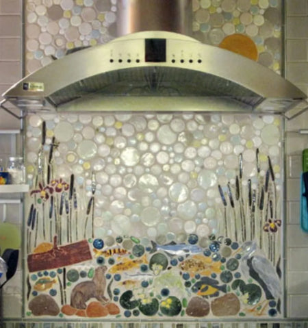 Tan concrete pigment in white grout, in a kitchen backsplash mosaic