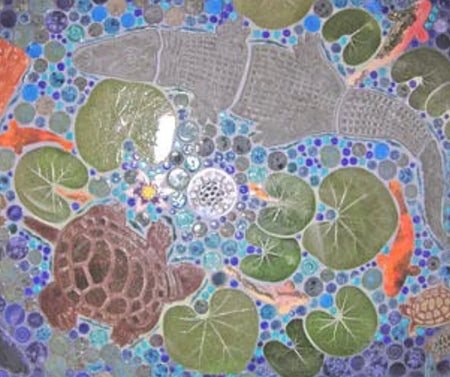 Gray concrete pigment in white grout, in a mosaic of turtles and lily pads