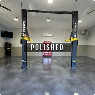 Automotive lift in a garage with 'Polished' text overlay