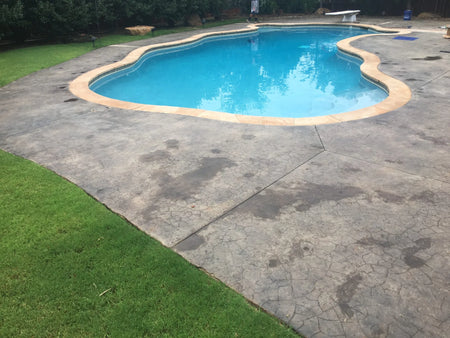 Before: A concrete pool deck in dire need of a refreshing makeover