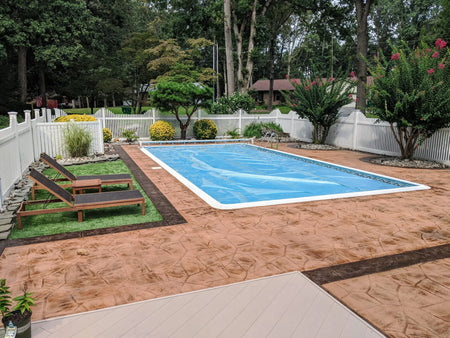 after faded stamped concrete pool deck cumin driftwood