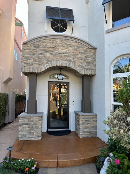 Residential front entry with a concrete porch and curved step finished in warm Cumin gloss