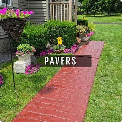 Red brick pathway with potted plants and a sign reading 'Pavers' in a garden setting.