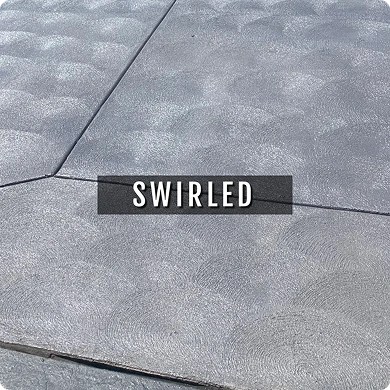 Swirled concrete surface with a label in the center.