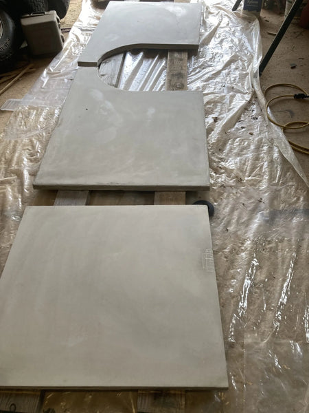 Freshly cured concrete slabs awaiting transformation