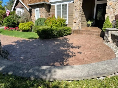 stained stamped concrete walkway entry