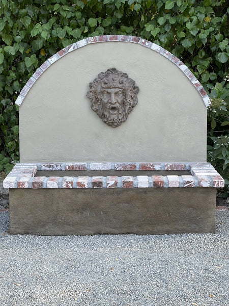 The concrete wall fountain after the application of Cumin Antiquing stain and sealed with EasySeal for added protection and durability