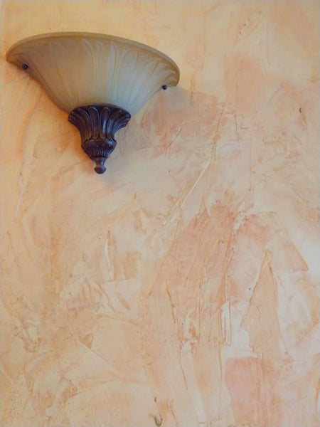 Malayan buff pigment mixed with white plaster wall design
