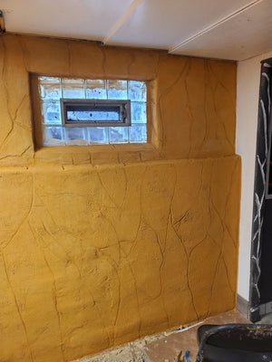 Stucco coat colored with maize pigment