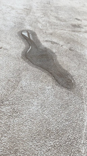 Water on sealed concrete surface after one hour