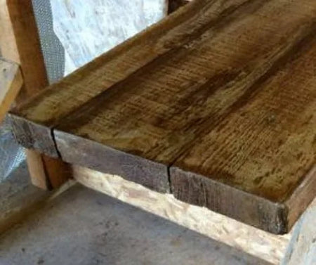 Wood-grain concrete countertop edge created with a silicone cast off real lumber