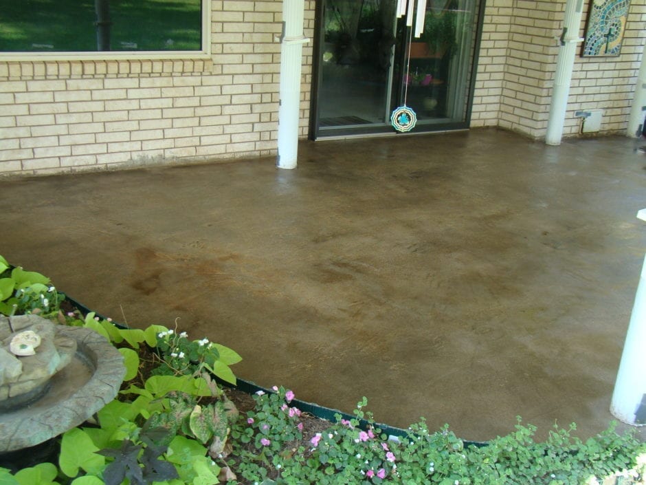 Old concrete patio stained with Olive Antiquing Concrete Stain and sealed with solvent based acrylic concrete sealer