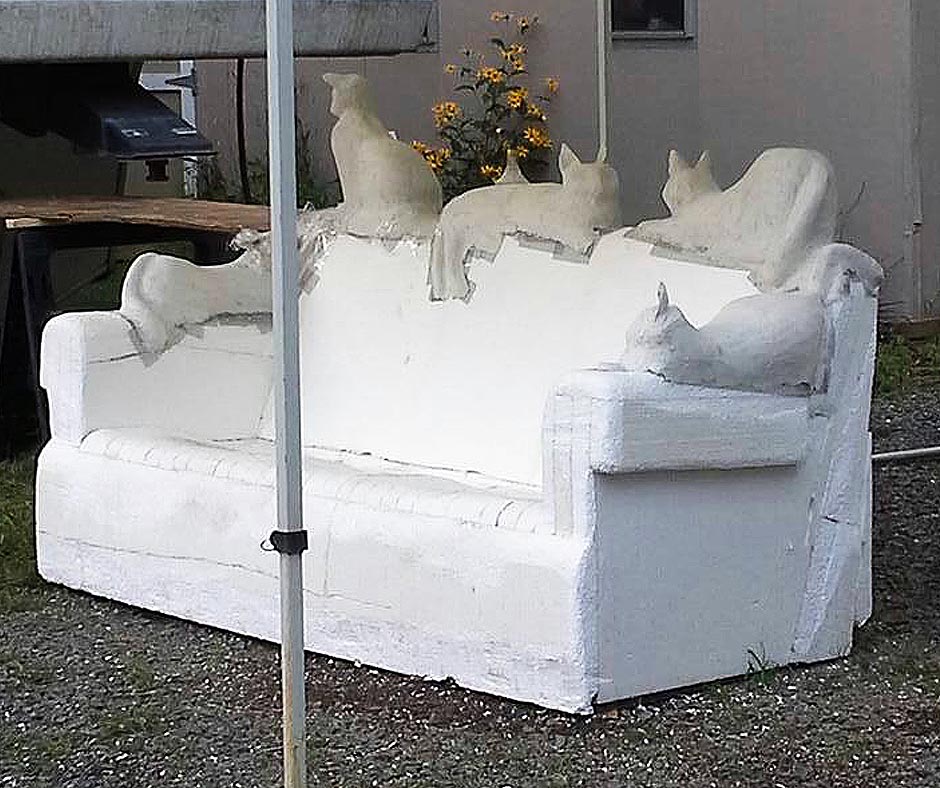 Concrete cats on concrete couch
