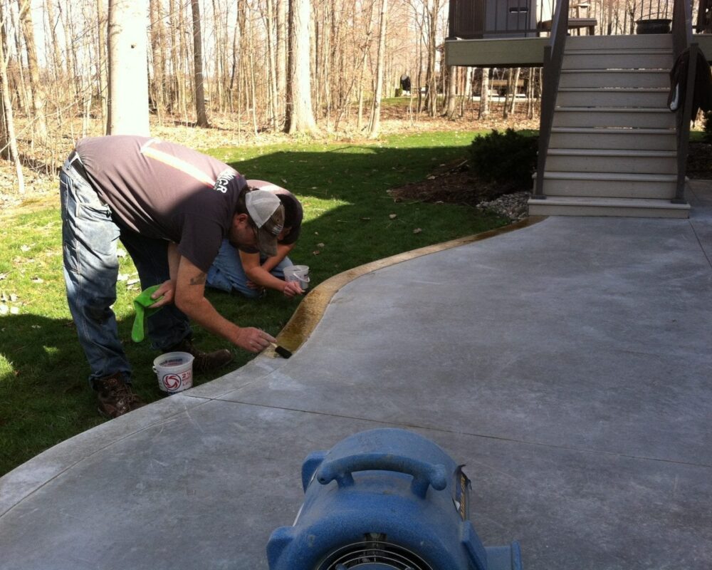 Applying Black Acid Stain to Outdoor Concrete