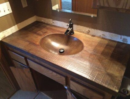Bathroom concrete vanity stained to look like wood
