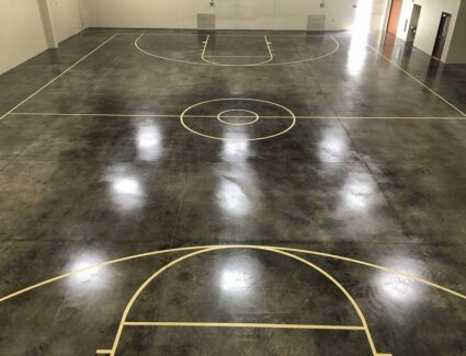 Black Concrete Acid Stained Indoor Basketball Court