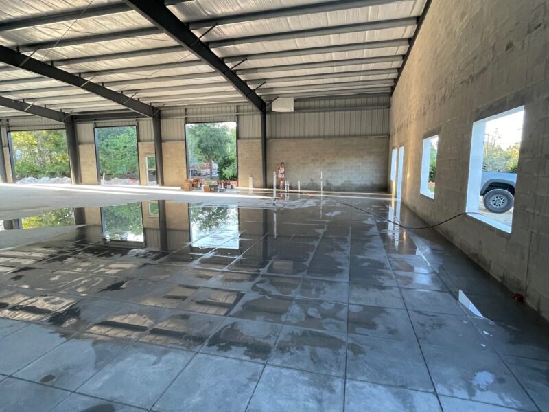 Photo of a clean and prepared concrete floor, ready for the application of acid stain to achieve a stunning transformation.