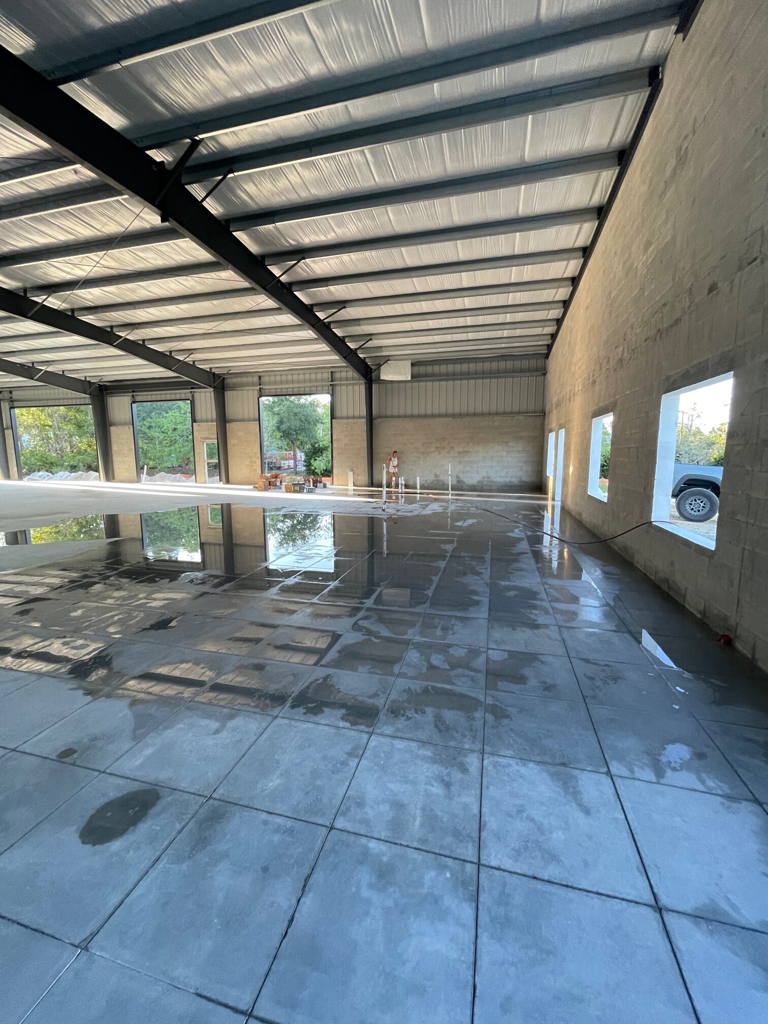 Photo of a clean and prepared concrete floor, ready for the application of acid stain to achieve a stunning transformation.