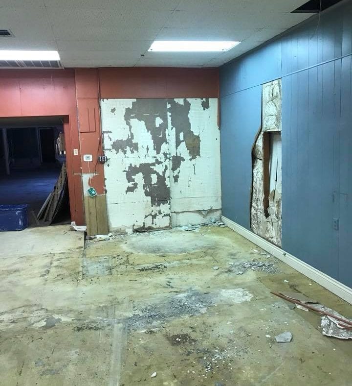 Prior to Concrete Overlay Condition of Floor and Walls Prior to Refinishing with Smooth Grey Concrete Overlay