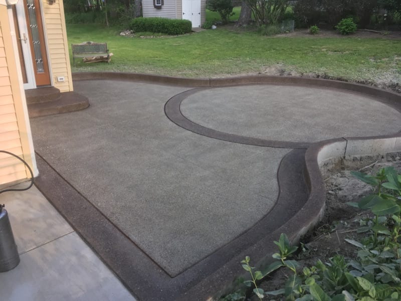 Chocolate Brown Stained Concrete Patio