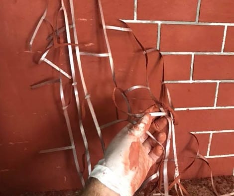 DIY faux brick wall stencil using 1/2" masking tape