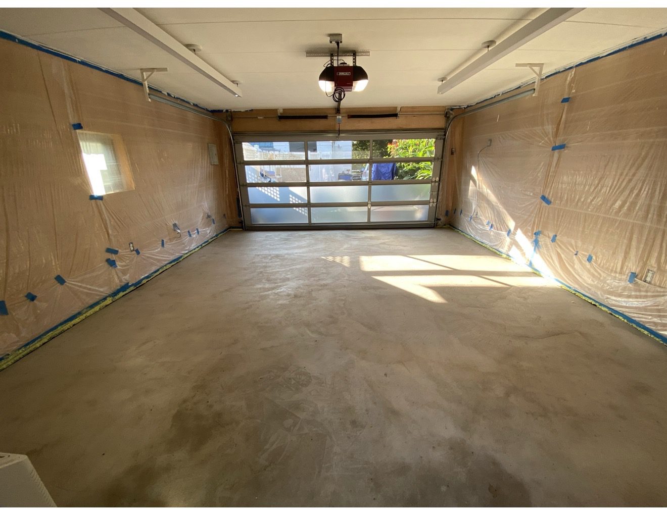 Picture of an old garage with an old concrete floor