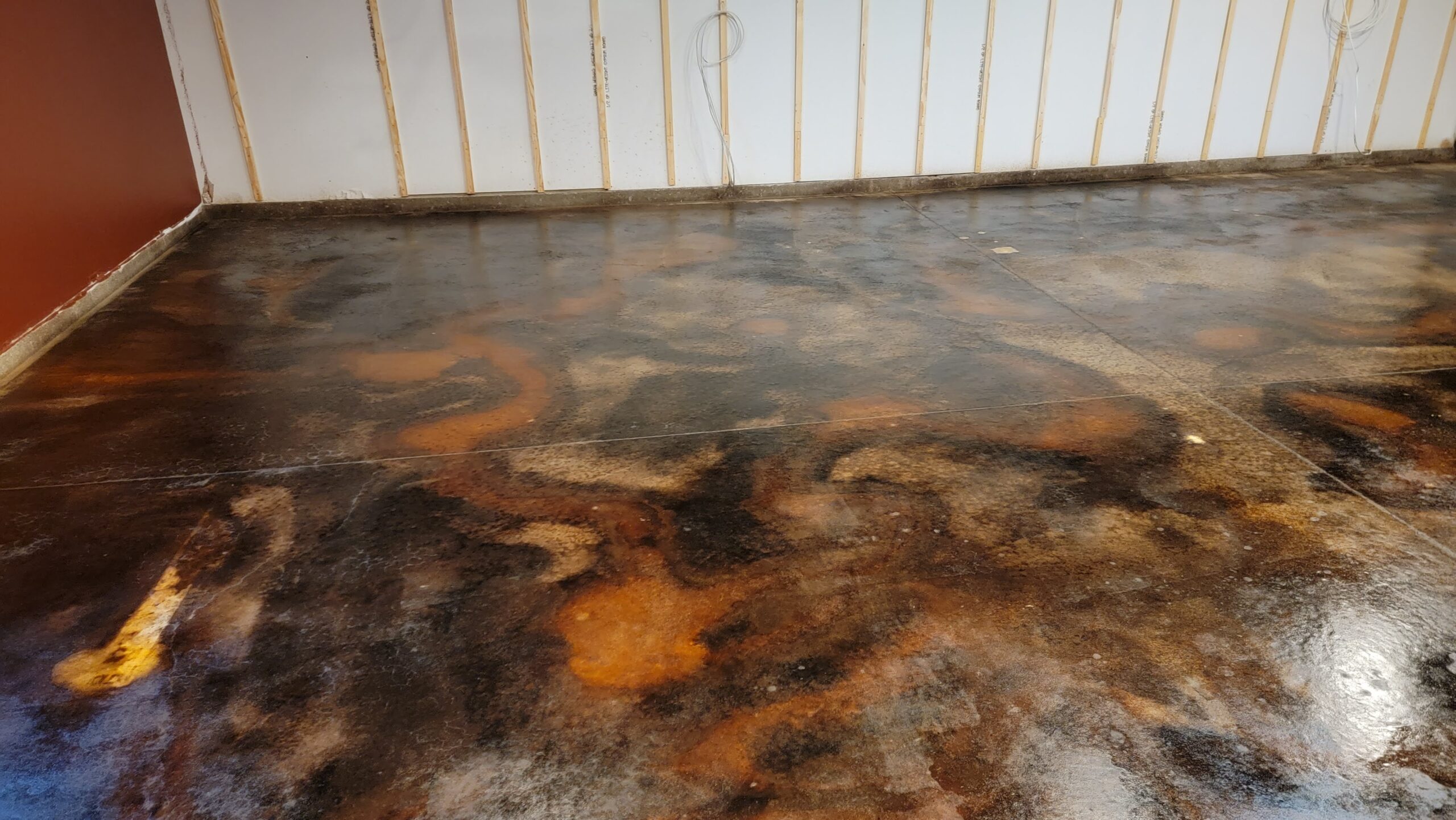 Sealed acid stained concrete garage floor