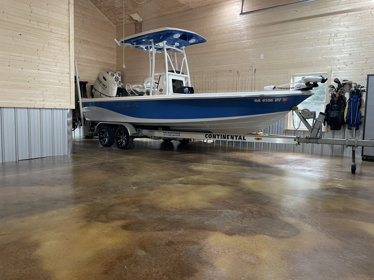 acid stained garage turned boat storage