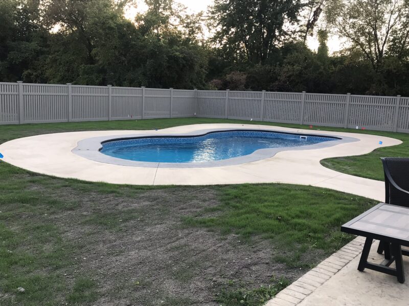 Neglected broomed finish concrete pool area prior to restoration