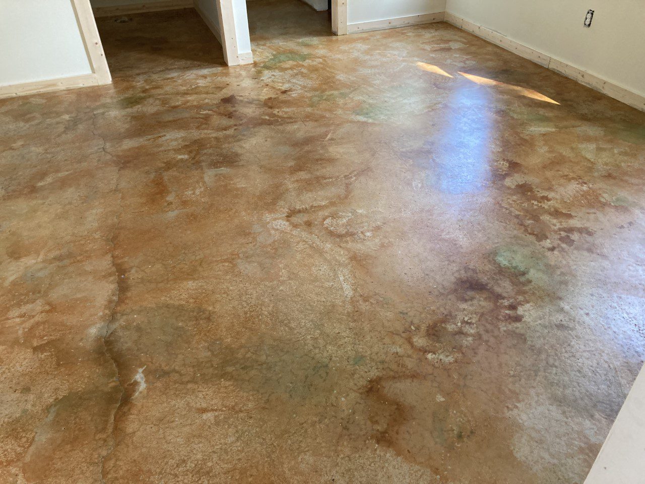 Sealed and waxed acid stained floor